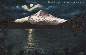 Mount Hood as seen across Lost Lake by moonlight, pictured on a postcard dating from circa 1930