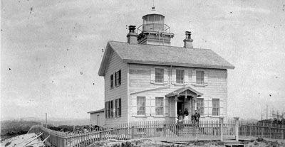 This very old photograph dates from just after the lighthouse was replaced by the Yaquina Head lighthouse.